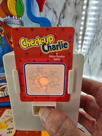 1995 Vintage "Check up Charlie" board game by Milton Bradley