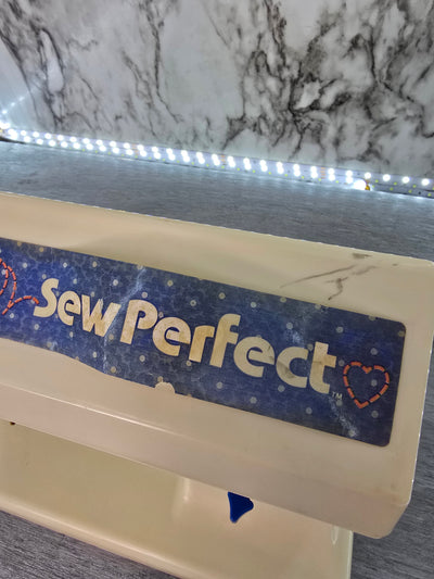1976 Mattel Sew Perfect sewing machine with assessories