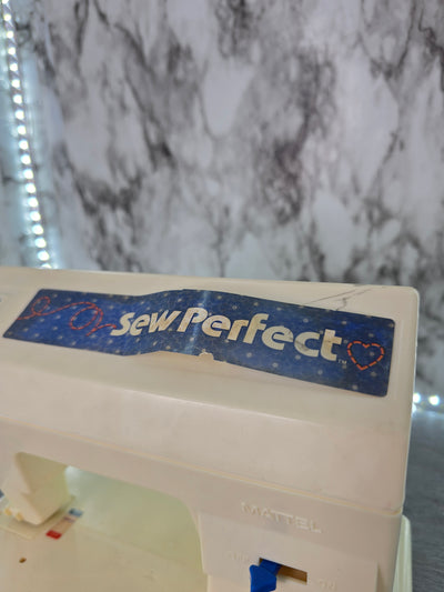 1976 Mattel Sew Perfect sewing machine with assessories