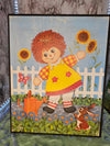 1970s Vintage MCM Raggedy Ann & Andy Garden themed mounted Prints by Lyn Stapco NY set of two