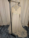 1960's Vintage MCM Ivory Wedding dress with Daisy detailing and a pastel green waist band